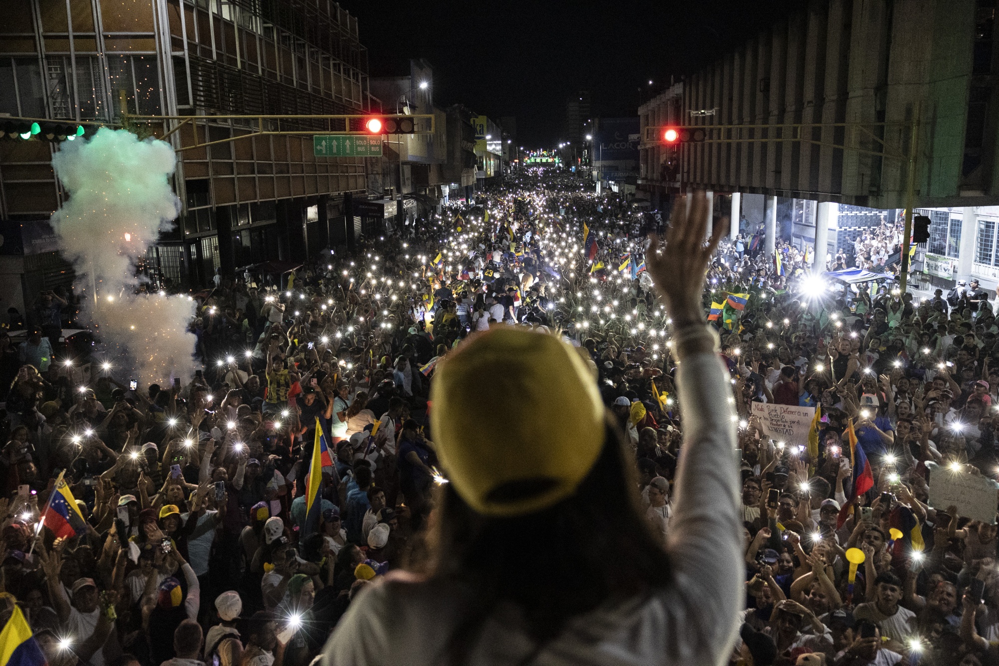 María Corina Machado greets her supporters during a rally in San Cristóbal, Táchira state.