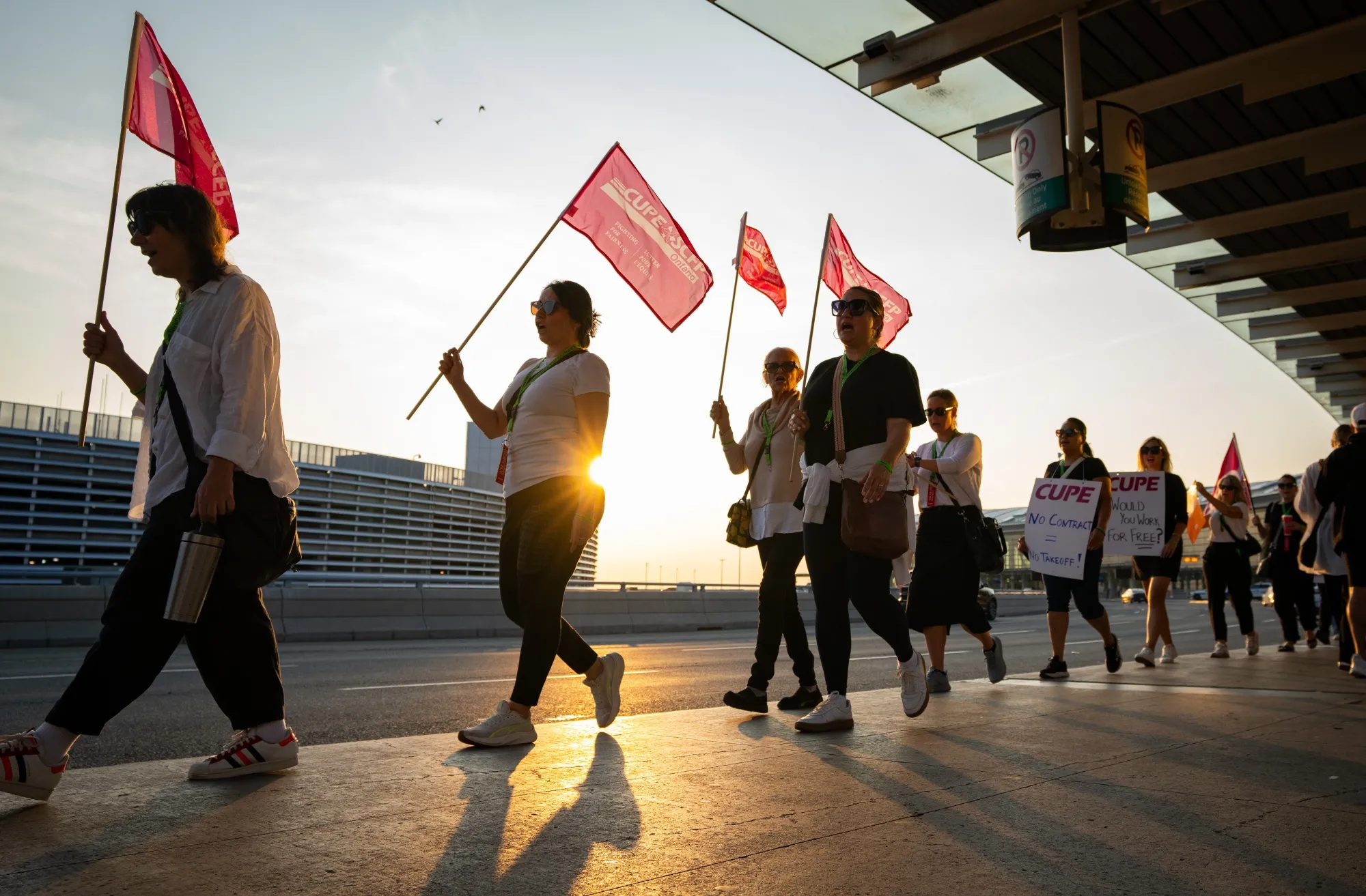 Air Canada flight attendants and supporters during a strike at Toronto Pearson International Airport on Aug. 16.