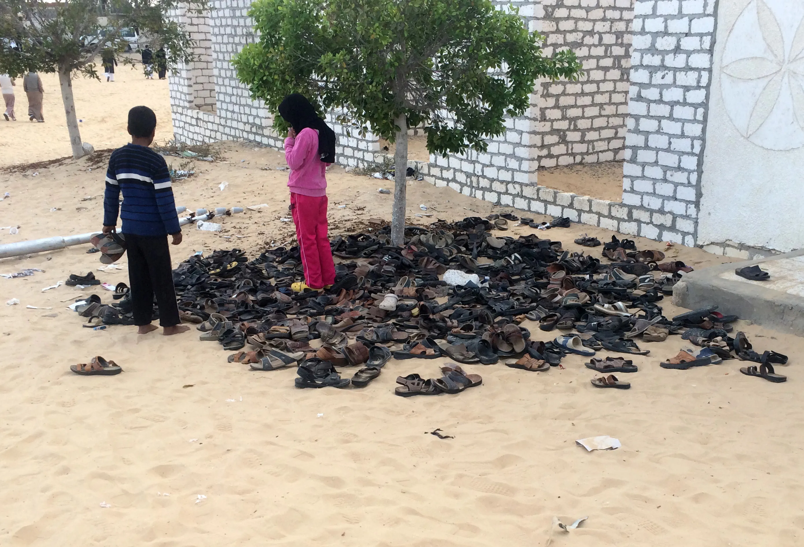 Victims’ footwear outside Rawda mosque.
