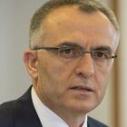 Headshot of Naci Agbal