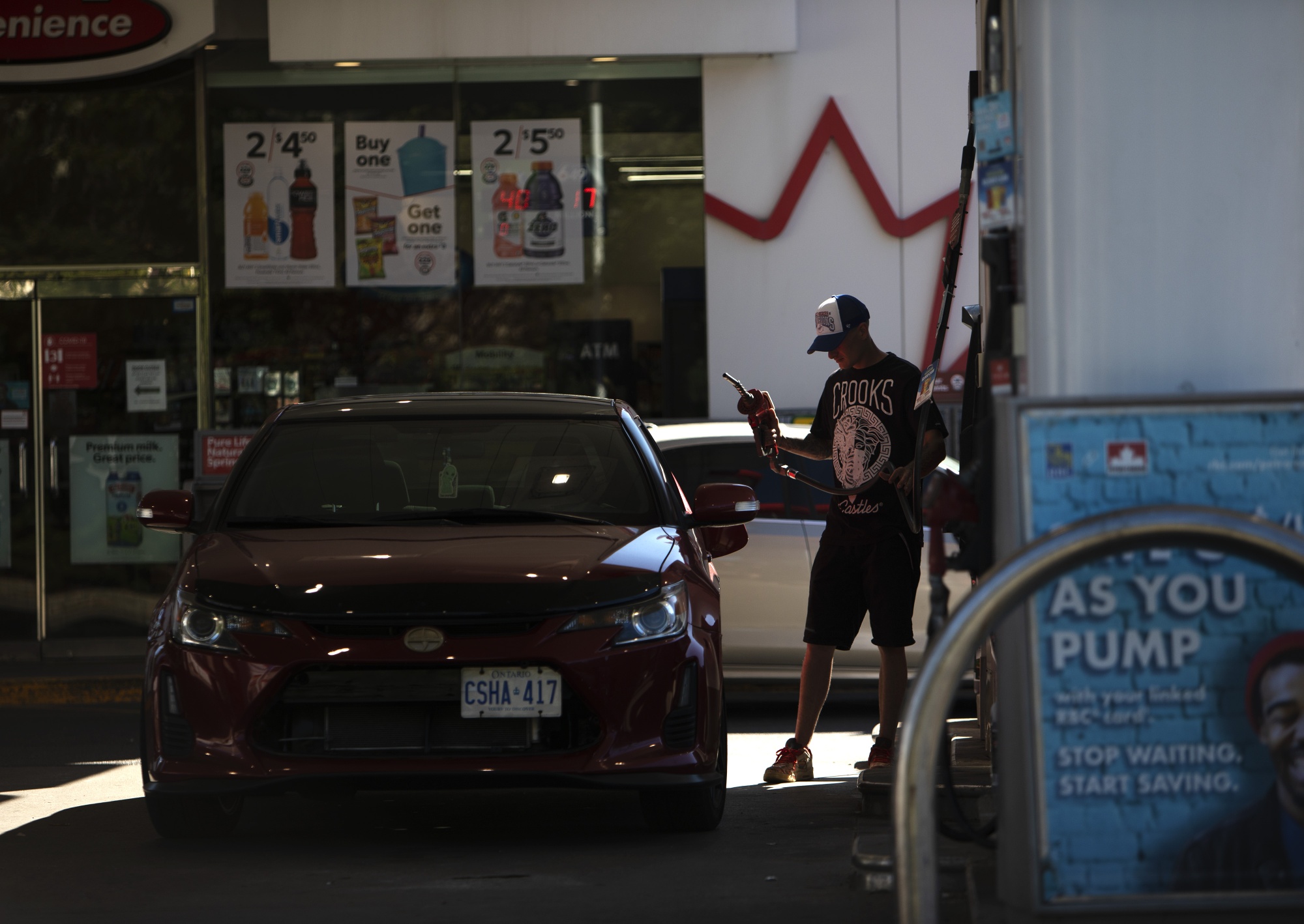 A customer refuels at a gas station in Toronto, Ontario, Canada, on July, 29.