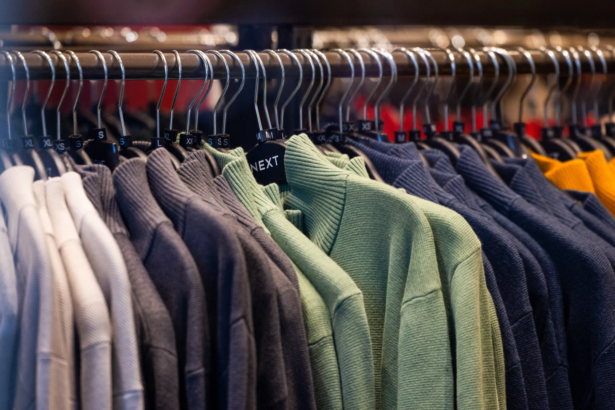 Next Plc Lifts Profit Forecast Again on Strong Holiday Sales