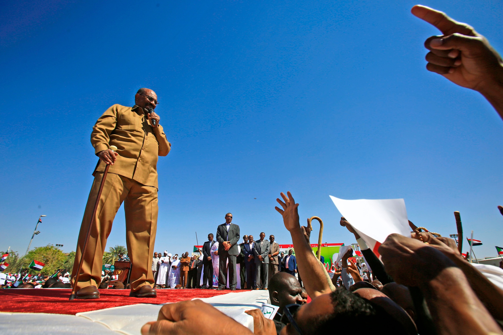 Omar al-Bashir speaks during a rally with his supporters&nbsp;on Jan.&nbsp;9.
