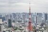 The Tokyo Tower is seen from the observatory in the Roppongi Hills Mori Tower, operated by Mori Building Co., in Tokyo, Japan, on Thursday, July 30, 2020. Officials in Japan are planning stricter measures on businesses and group activities as coronavirus cases continue to spread from a concentration around the capital to other urban areas across the country.