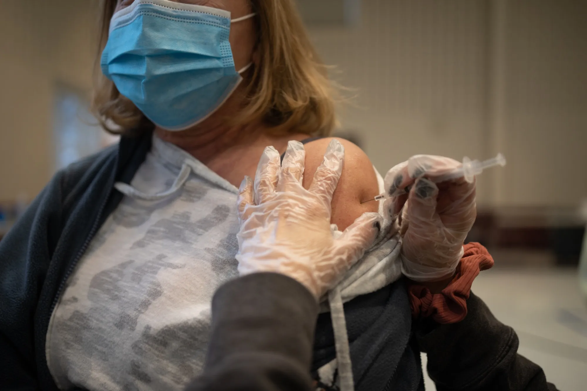 A resident receives a Covid-19 booster shot at a vaccine clinic&nbsp;in Lansdale, Pennsylvania.