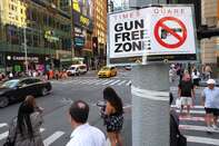 "Gun Free Zone" Signs Posted Around Times Square As New State Law To Take Effect Thursday