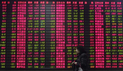 China’s Stocks Fall to Three-Week Low on Property Curbs Concern