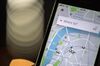 A London street map sits on a smartphone using the Uber Technologies Inc. ride-hailing service smartphone app in this arranged photograph in London, U.K., on Friday, Dec. 22, 2017. Uber will be regulated in European Union countries as a transport company after the bloc's top court rejected its claim to be a digital service provider, a decision that could increase legal risks for other gig-economy companies including Airbnb.