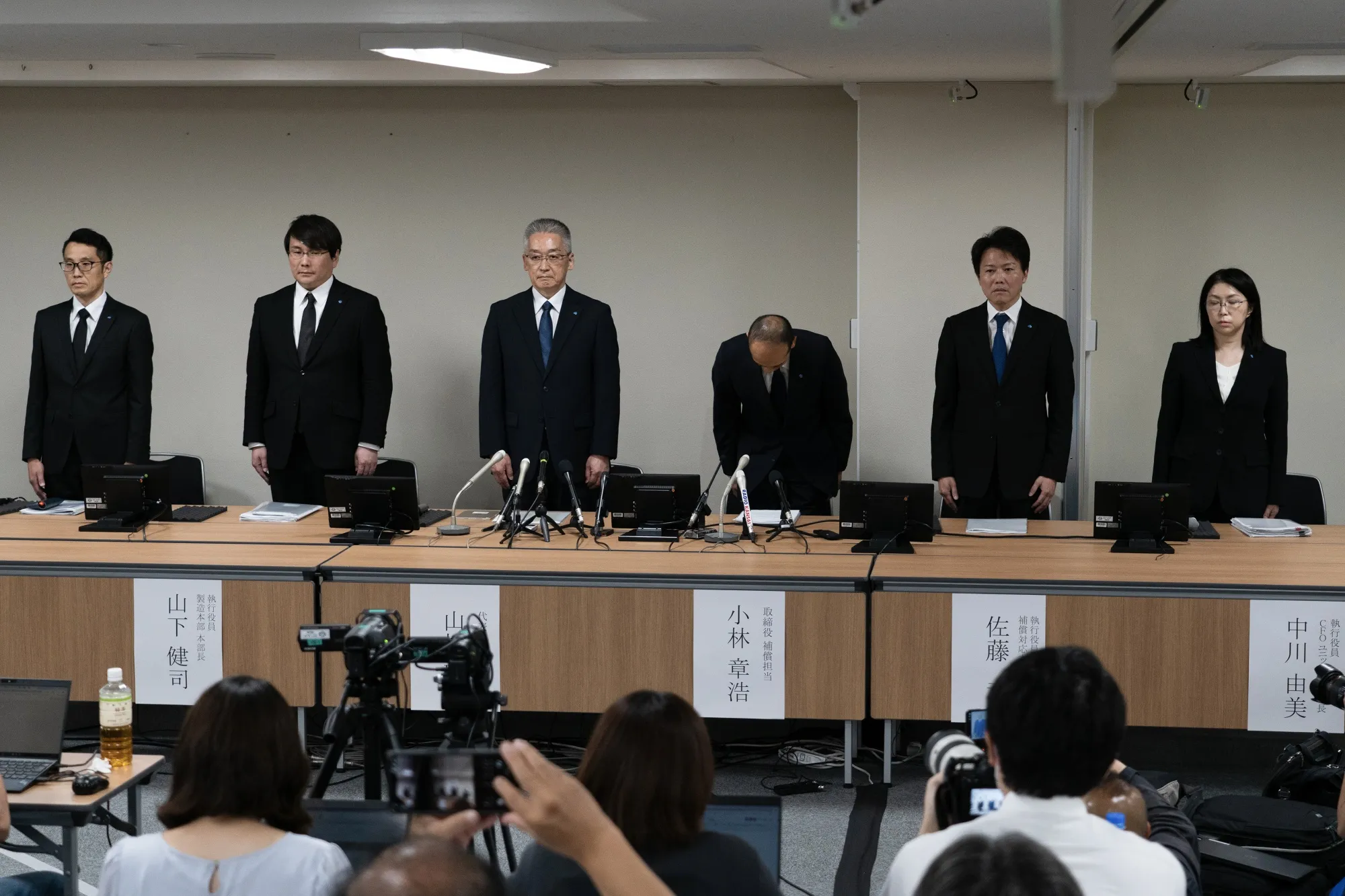 Akihiro Kobayashi bows during a news conference in Osaka on Aug. 8.