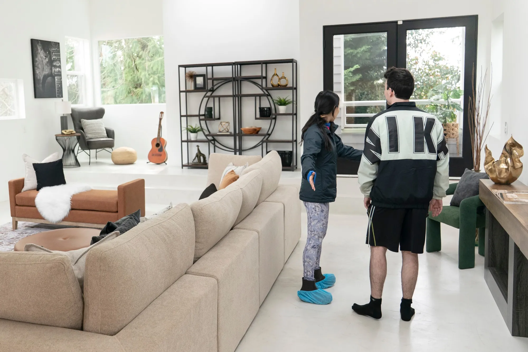 Prospective buyers take a tour during an open house at a home in Seattle.
