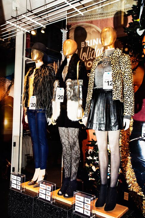 Window displays include trendy women's clothing (pictured) and local designs from art school students.