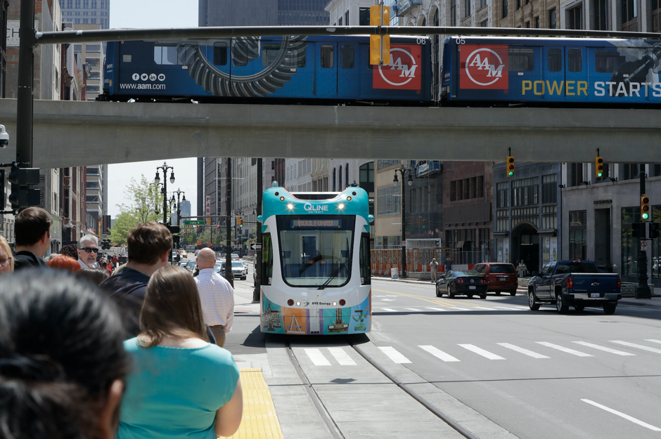 The $140 million QLine light rail system will connect Campus Martius in downtown Detroit to the city's New Center. The QLine features three-piece streetcars that are each 66 feet long and can carry an average of 125 passengers per car. The project was led by private businesses and philanthropic organizations in partnership with local, state and the federal government.