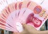 Genuine bundles of Chinese one-hundred yuan banknotes are arranged for a photograph at the Counterfeit Notes Response Center of KEB Hana Bank in Seoul, South Korea, on Friday, July 13, 2017. Yuan is set to slide for fifth week, longest losing streak since July 2016, as escalating U.S.-China trade tensions weigh on sentiment.