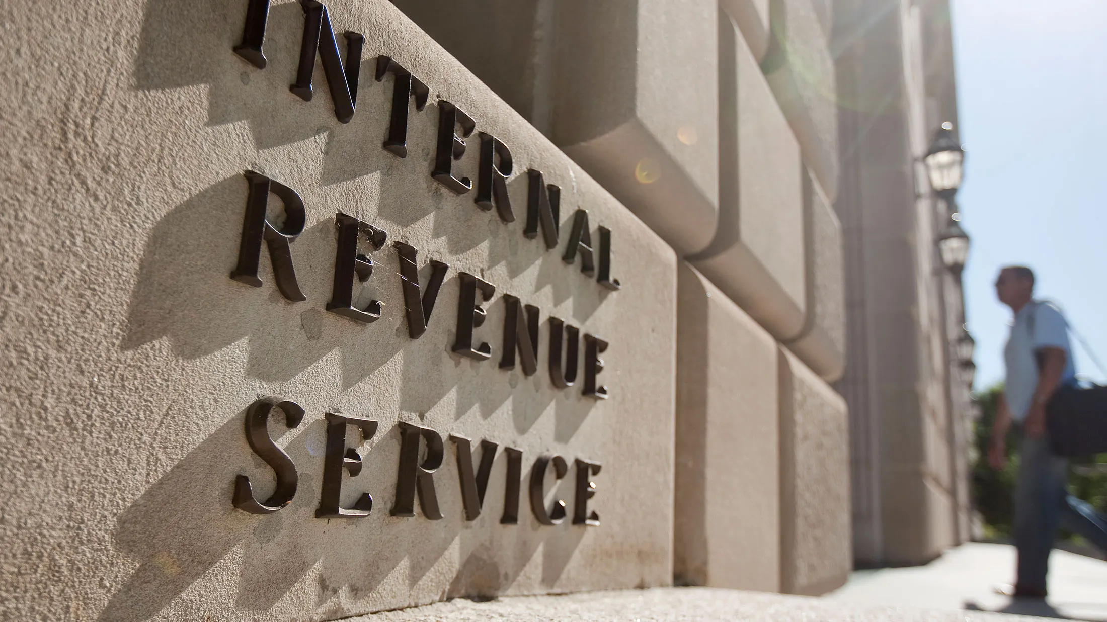 A man enters the Internal Revenue Service (IRS) building in Washington, D.C., U.S., on Friday, May 7, 2010.
