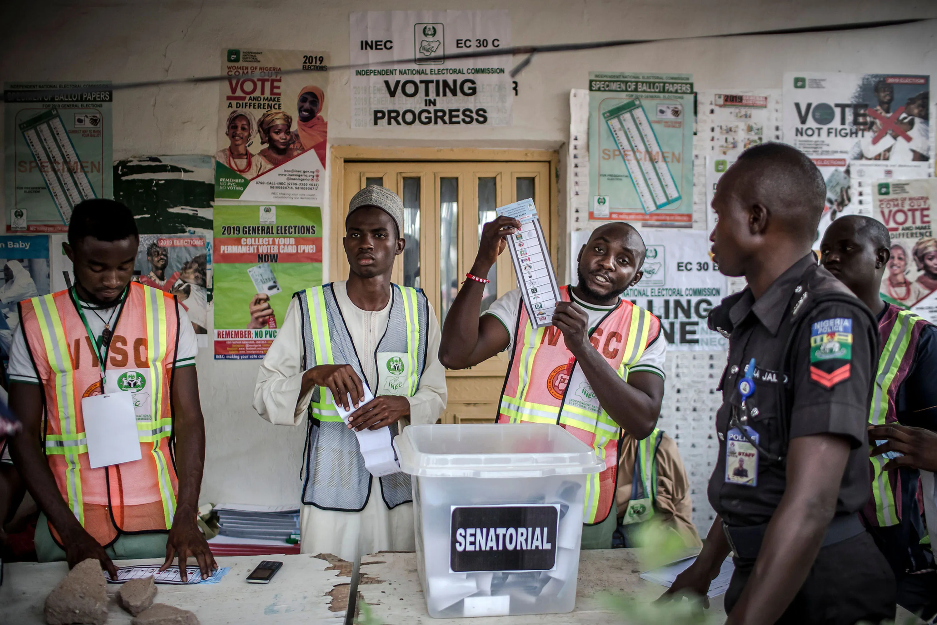 Electoral commission officers count votes at Shagari Health Unit polling station in Yola.