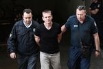 Alexander Vinnik arrives at court in Thessaloniki on Oct. 4, 2017.