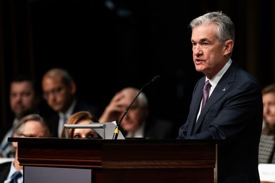 Powell's ‘Just Below’ Comment Seen as Suggesting Fewer Hikes