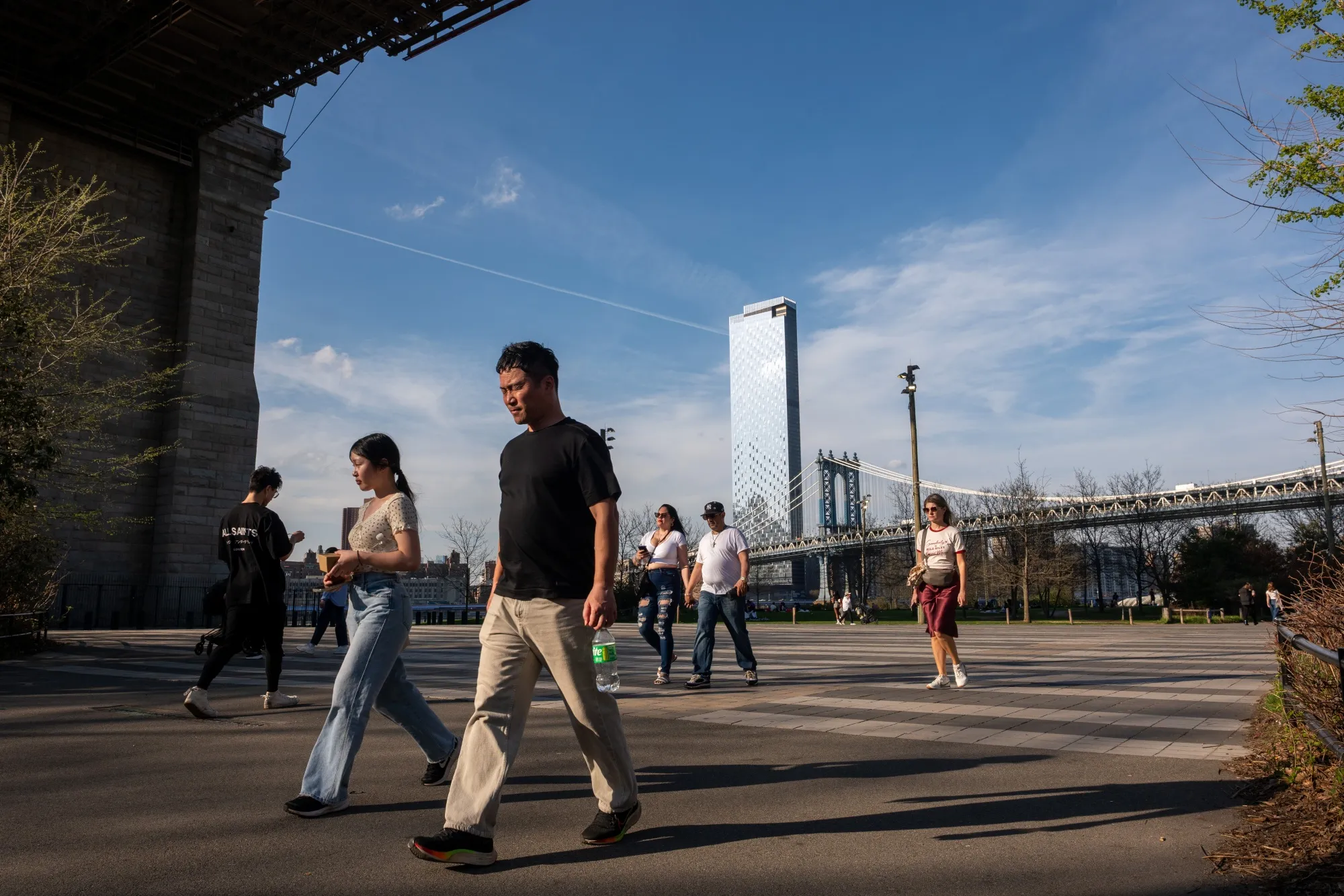 Visitors at Brooklyn Bridge Park&nbsp;in New York City on April 14.&nbsp;
