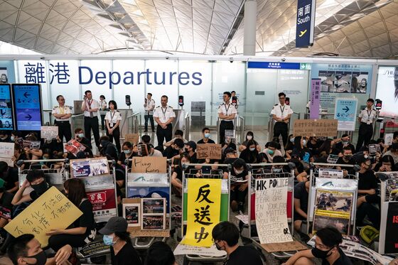 Airport Cleans Up After Night of Protest Chaos: Hong Kong Update