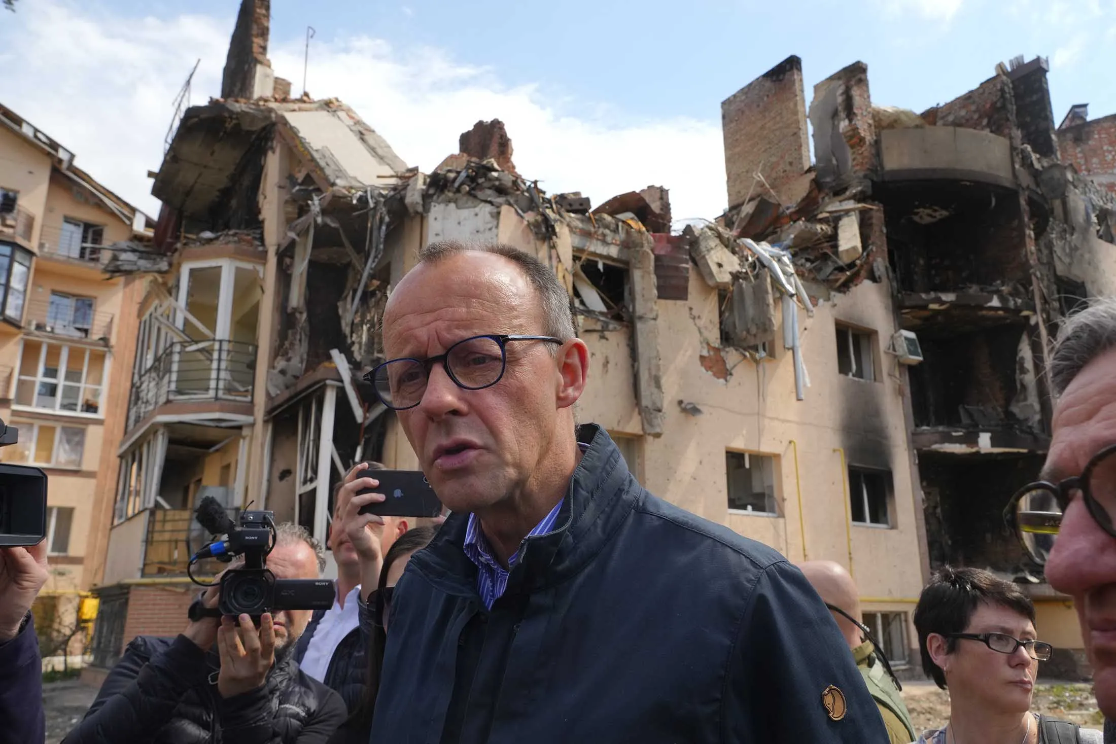 German opposition leader Friedrich Merz in Irpin, Ukraine, on May 3.