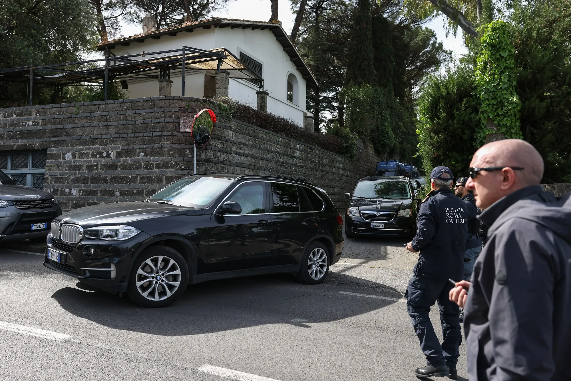 The US delegation leaves the Omani embassy, in Rome.