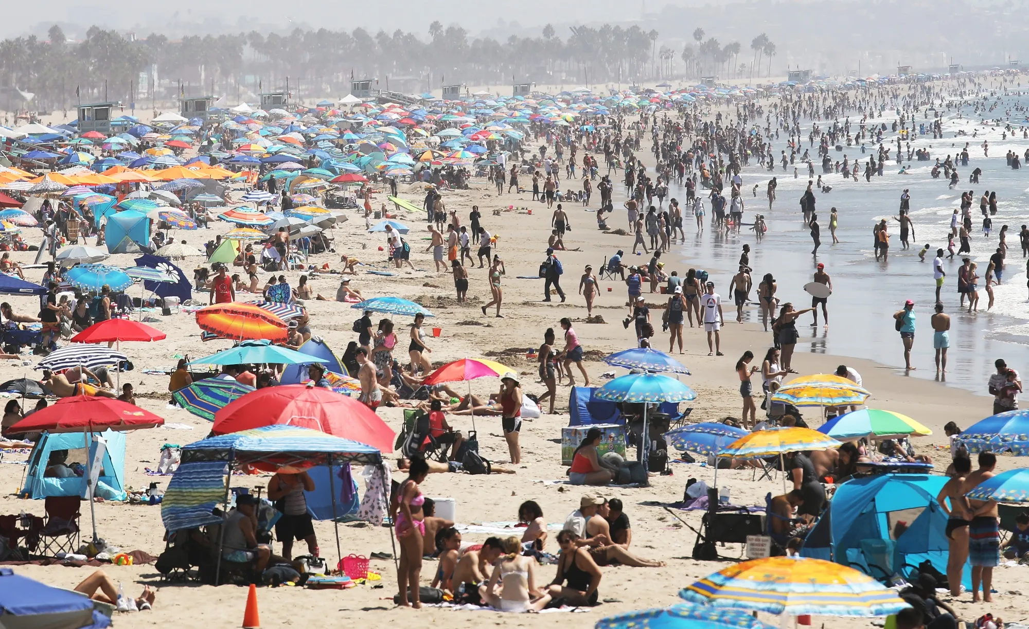 People gather on the beach at the Pacific Ocean on the first day of the Labor Day weekendin Santa Monica, California on Sept.&nbsp;5.