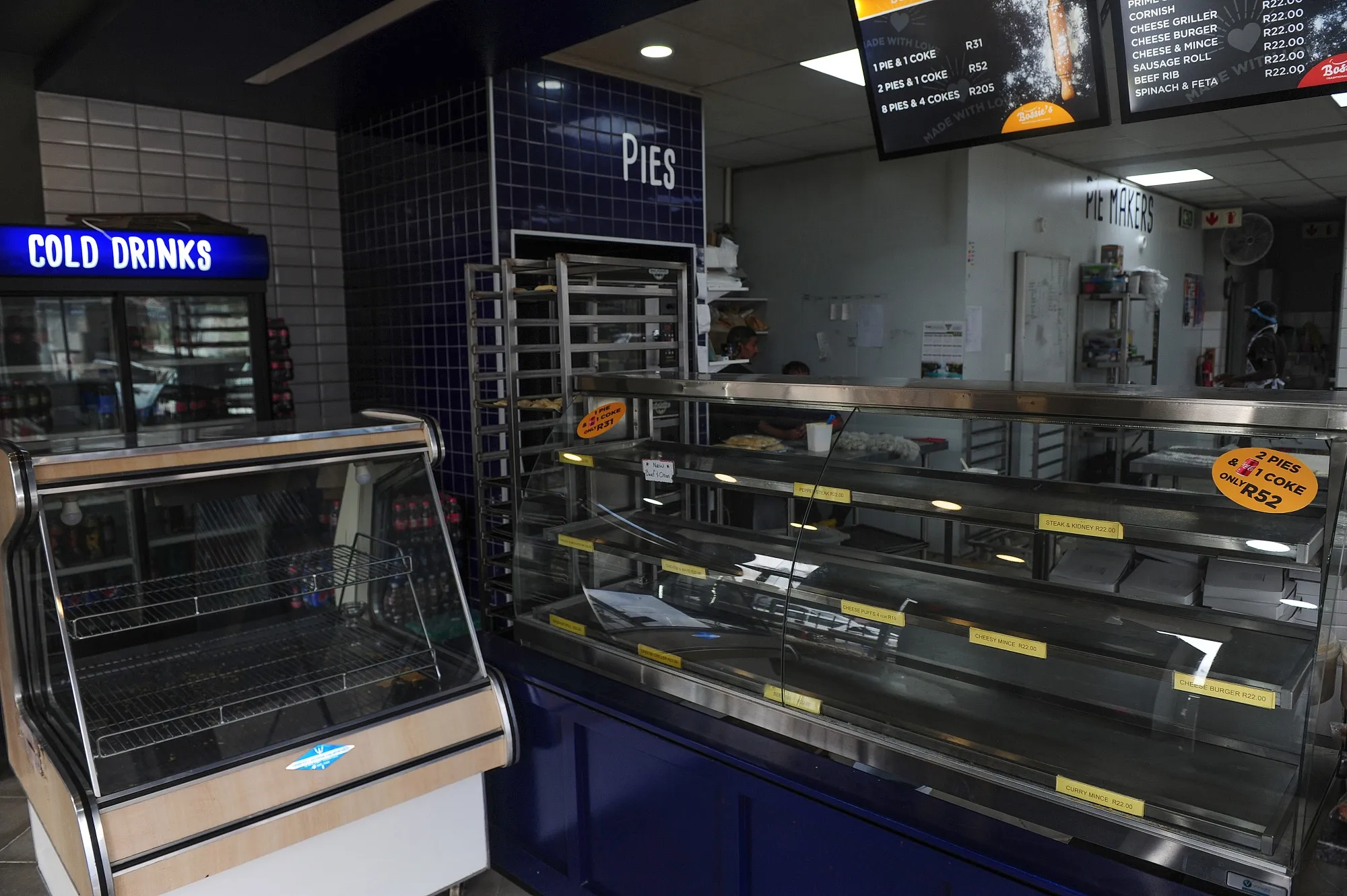 Empty shelves inside a pie shop during a loadshedding power outage period, in Johannesburg, South Africa.