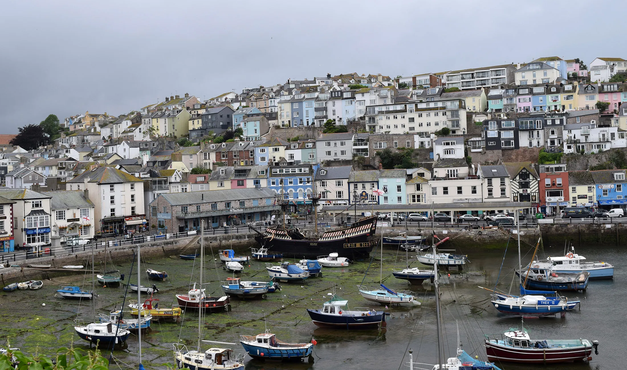 Boats sit in the harbour at Brixham.