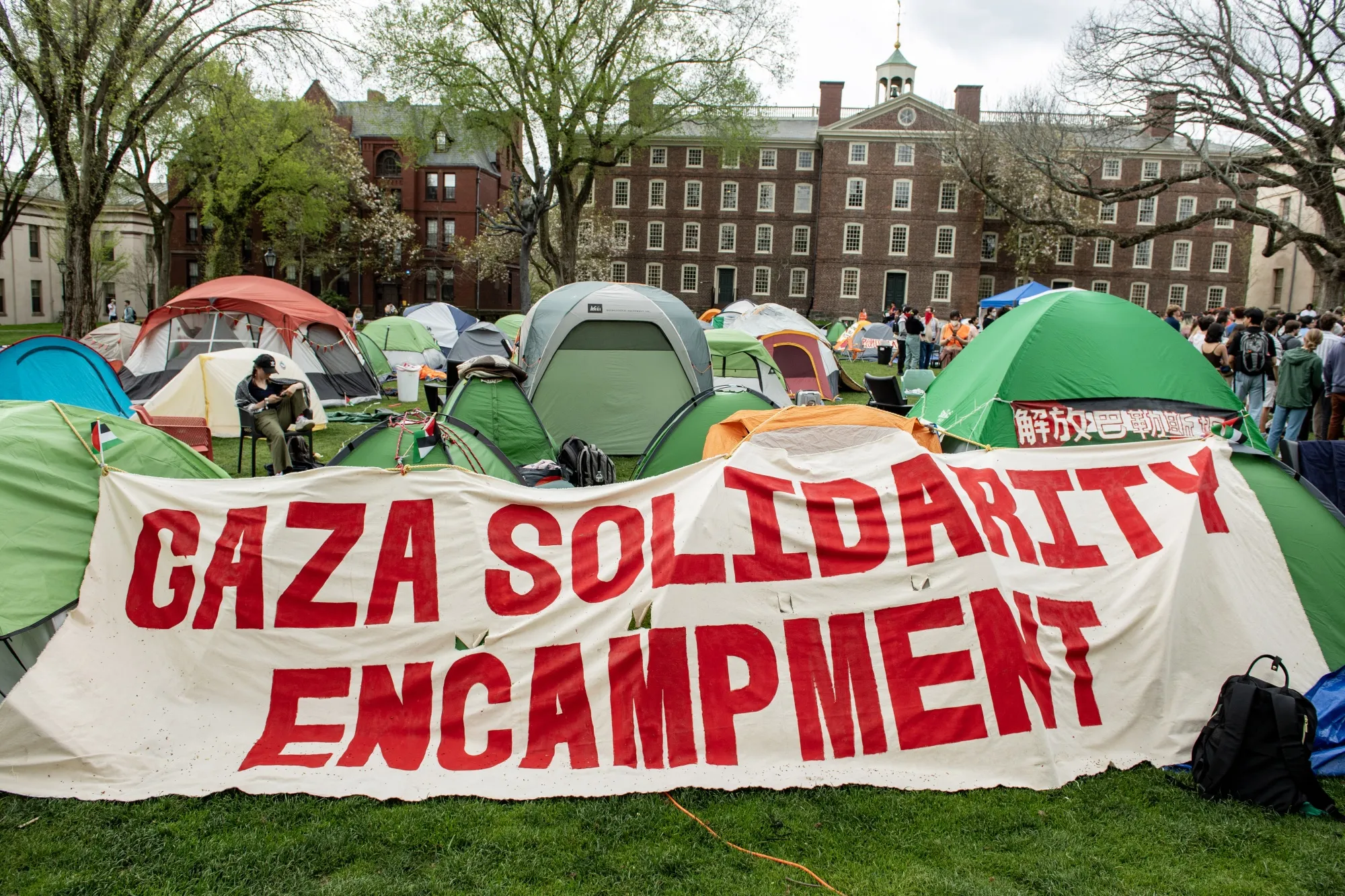 Students and community members hold a pro-Palestine rally at the encampment at Brown University in Providence in April 2024. 