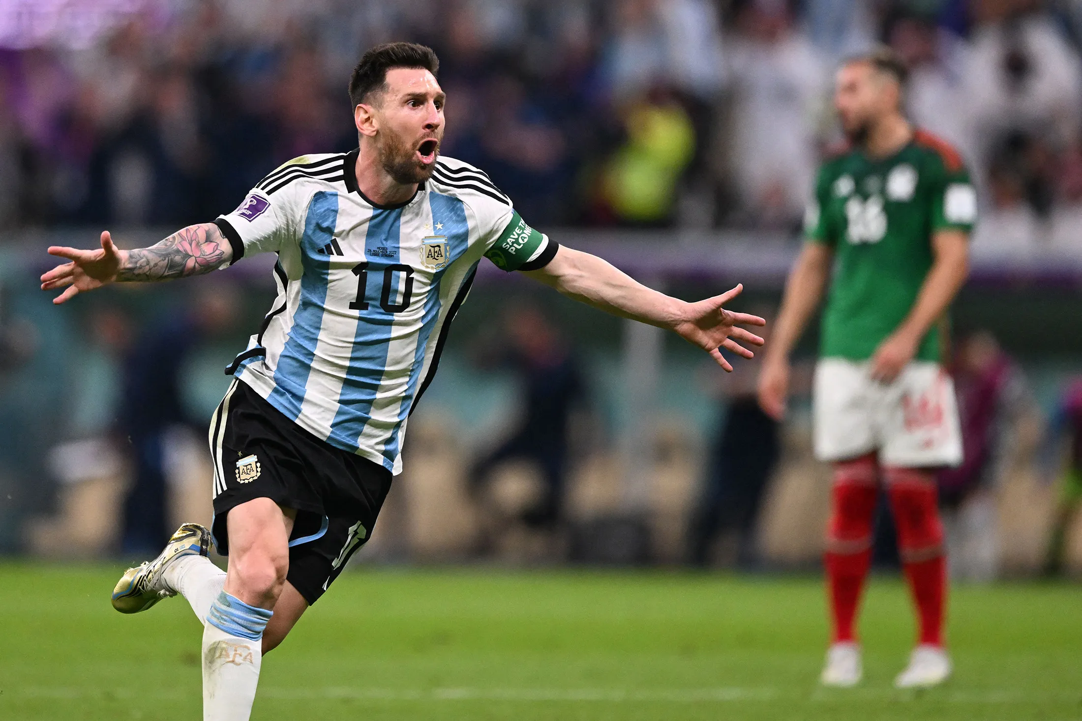 Argentina's&nbsp;Lionel Messi celebrates scoring the opening goal during the 2022 World Cup&nbsp;match against&nbsp;Mexico at the Lusail Stadium in Lusail, Qatar, on&nbsp;Nov. 26.