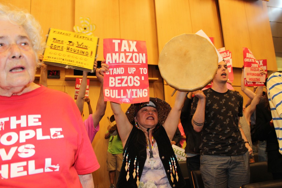 Linda Sorino of Lummi Nation, a resident of Seattle and volunteer outreach worker for the homeless, protests with other supporters during the Seattle City Council vote Monday.