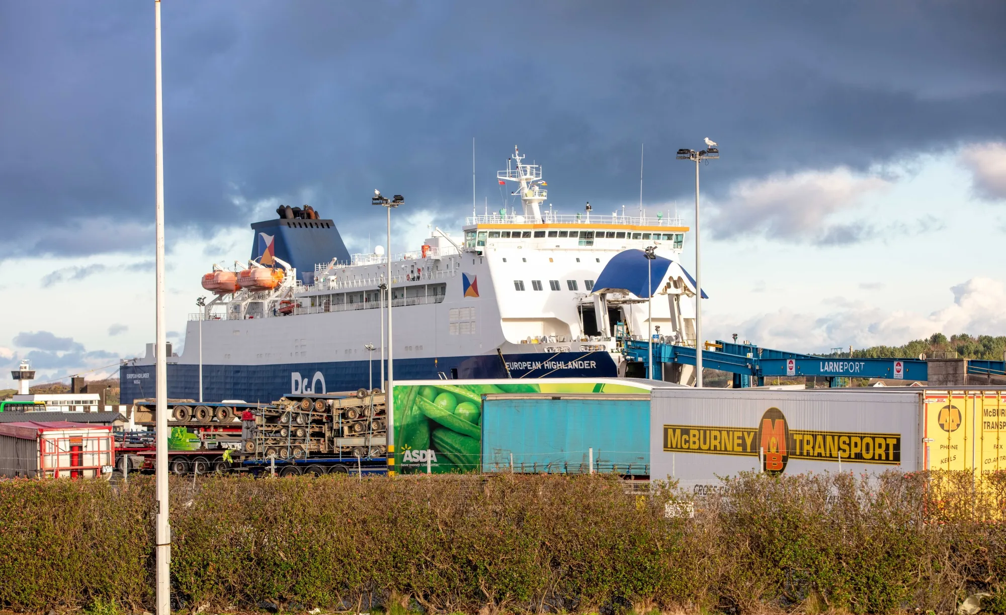 Haulage trucks near the European Highlander ferry at Larne Port in Larne, Northern Ireland.