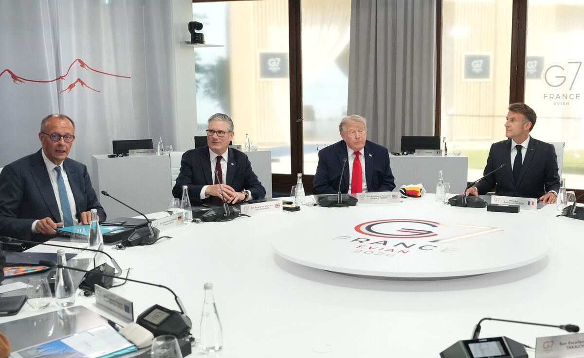 German official presents football jersey to U.S. president at G7 summit