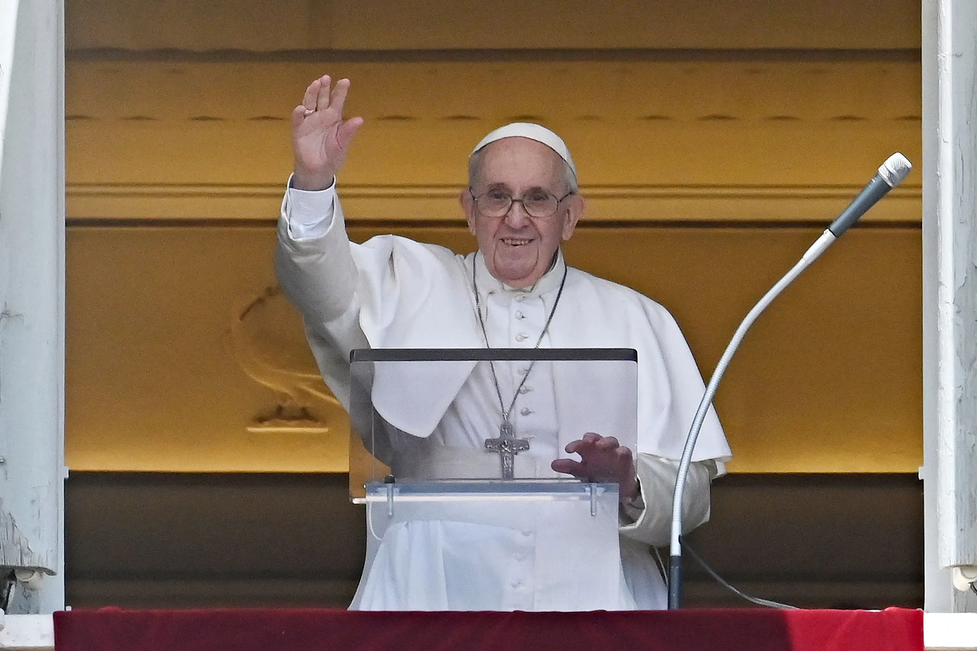 Pope Francis delivers the Sunday Angelus prayer overlooking St. Peter' Square at the Vatican, on July 18.