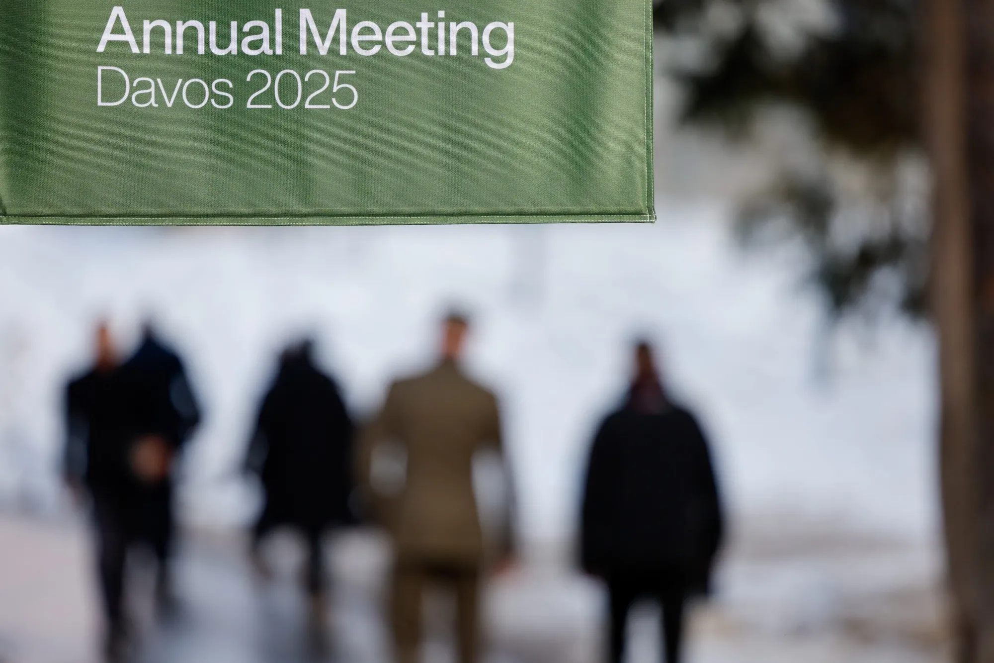 Attendees walk between venues at the World Economic Forum&nbsp;in Davos.