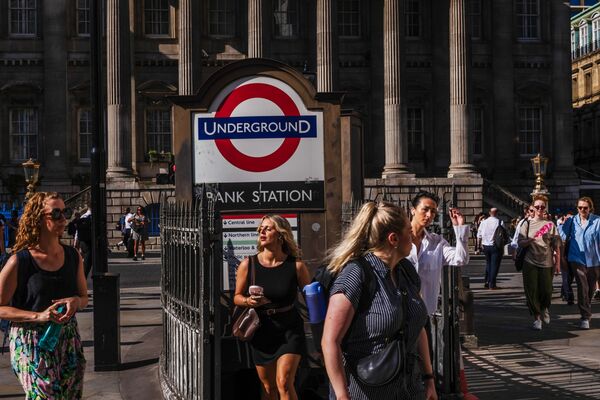 City Workers And Commuters During UK Heat Wave