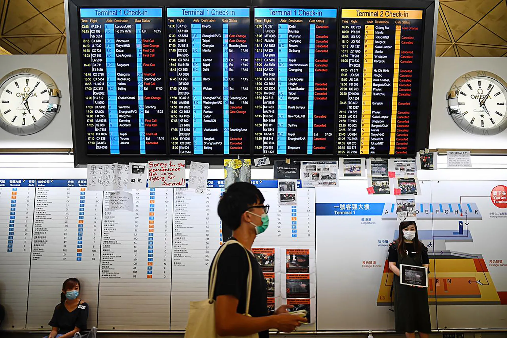 An electronic board showing cancelled flights at Hong Kong's international airport on Aug. 12.