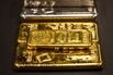 Gold Falls on Stronger Dollar as US Offers Auto Tariff Reprieve