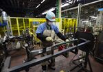 A worker at a Toyota Motor Corp.