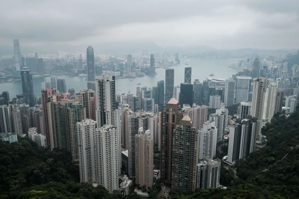 The skylines of Kowloon and Hong Kong Island.