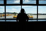 A taxi driver looks on at John F. Kennedy Airport&nbsp;in New York City.