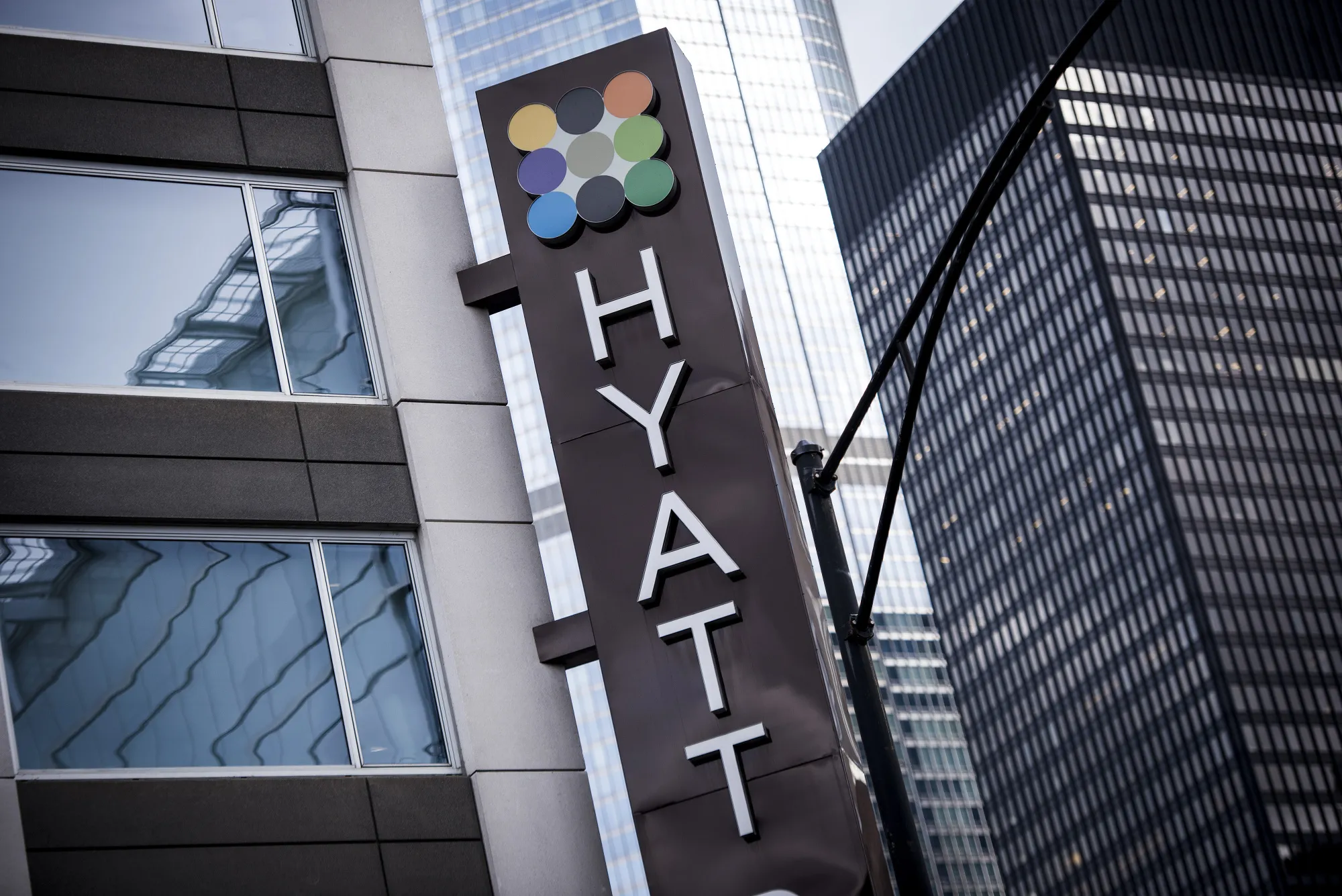 Signage is displayed outside the Hyatt Place hotel in Chicago, Illinois, U.S., on Monday, Oct. 30, 2017. Hyatt Hotels Corp. is scheduled to release earnings figures on November 2.
