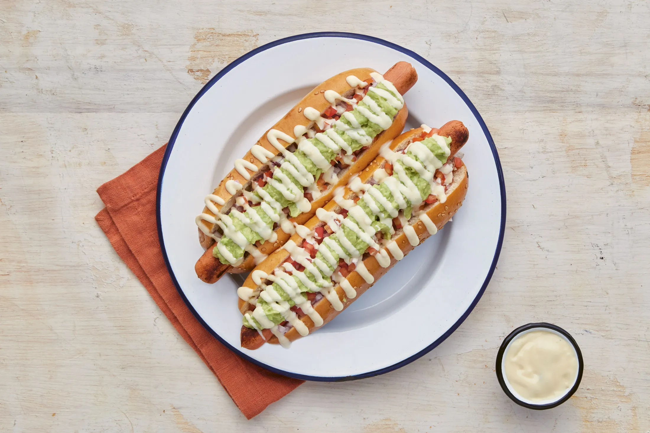 Chilean hot dogs whose generous toppings invoke the colors of the Italian flag.