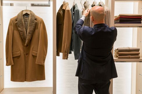 A mink and vicuna overcoat hangs in the Loro Piana store in Milan.