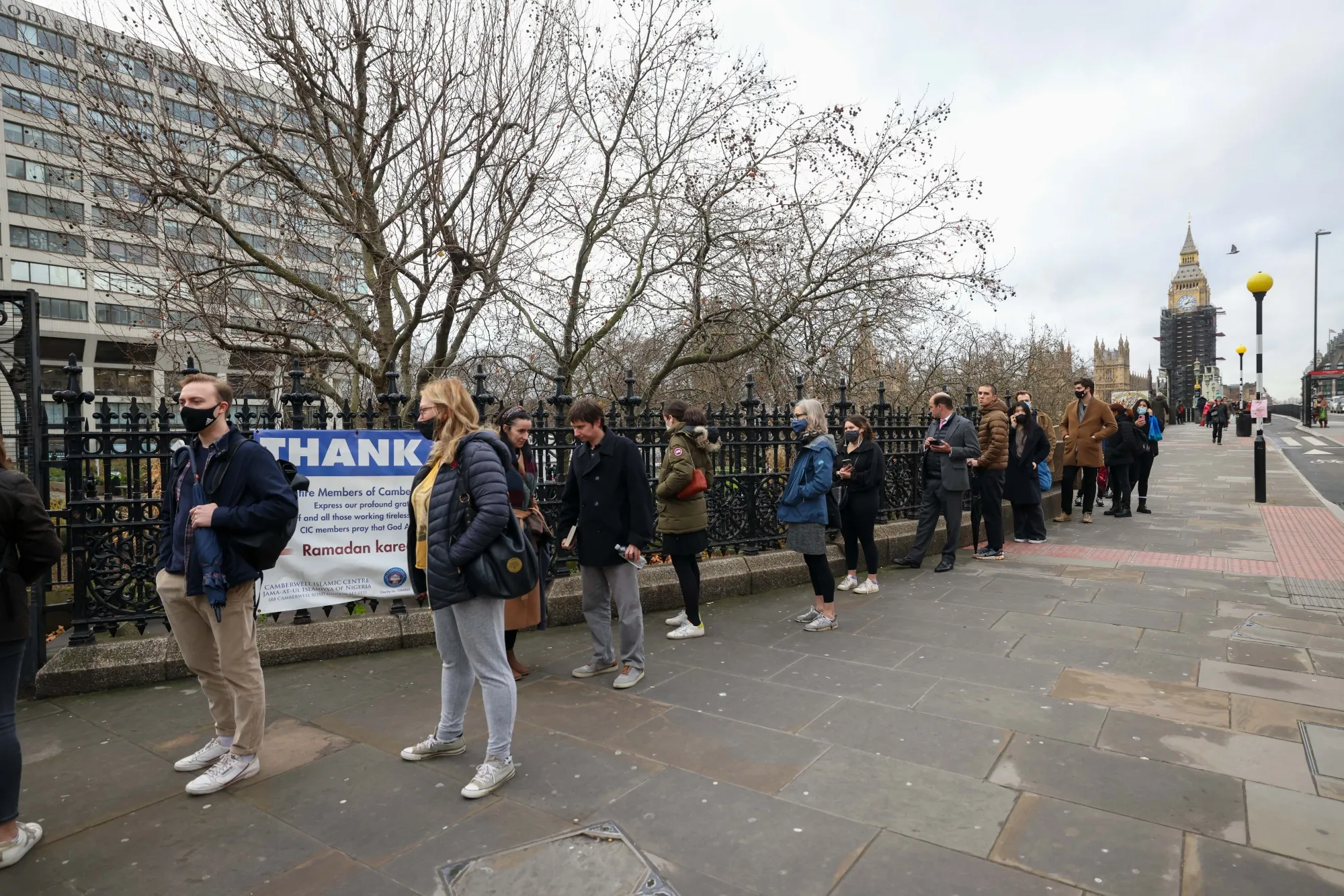 Visitors queue for Covid-19 vaccinations at St. Thomas' Hospital in London.