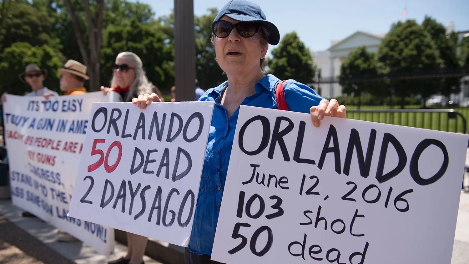 People gather to protest gun violence outside the White House on June 13, 2016, in Washington.
