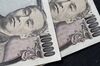 Japanese 10,000 yen banknotes are arranged for a photograph in Tokyo, Japan on Sunday April 14, 2019. U.S. Treasury Secretary Steven Mnuchin said he wanted a currency clause in a trade deal with Japan to prevent deliberate manipulation of the yen to bolster exports, Japanese public broadcaster NHK said.