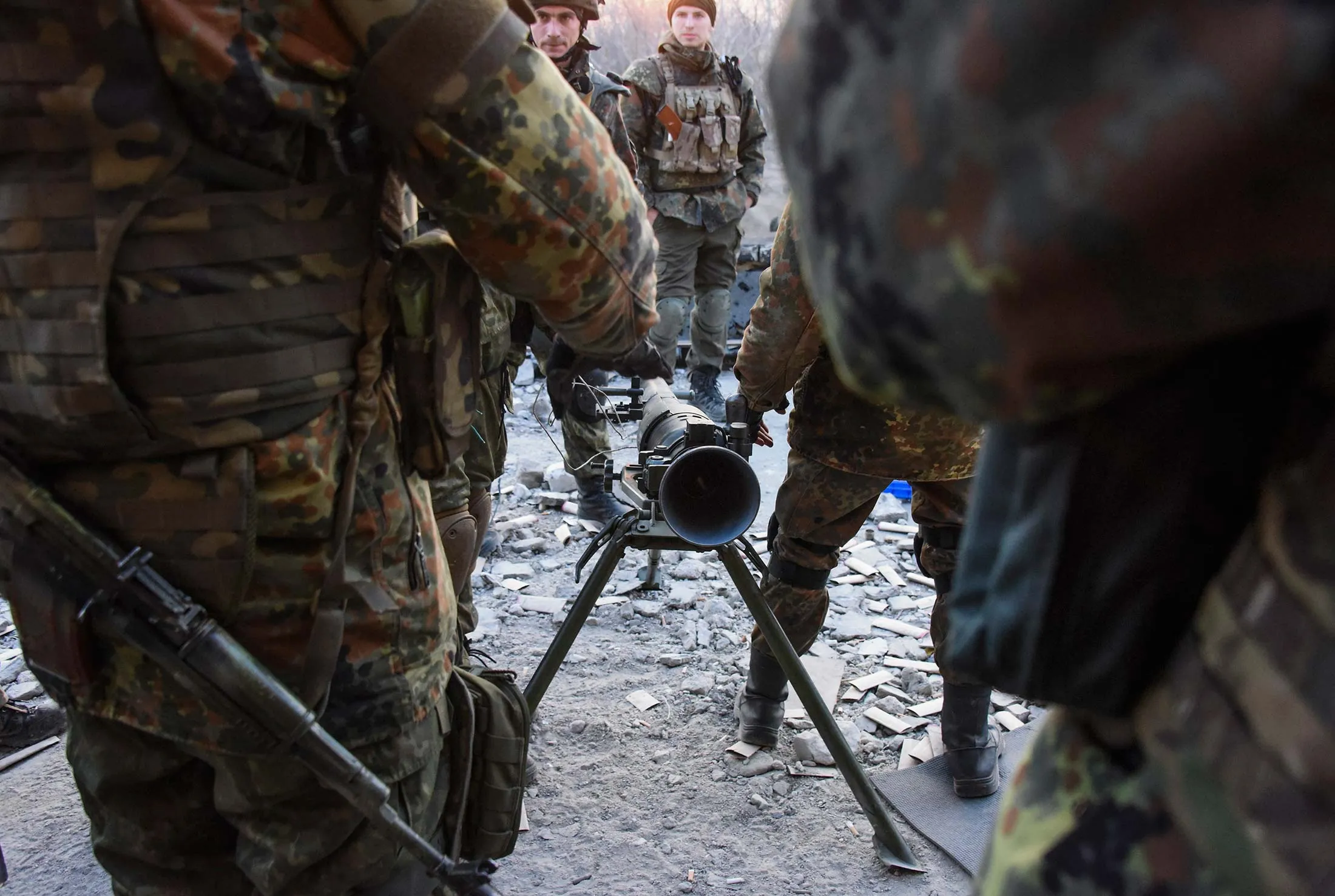 Fighters of the Azov Battalion prepare to fire an anti-tank weapon in the town of Shyrokyne, eastern Ukraine on Sunday, March 23. Government and Russian-backed separatist forces face off against one another across an unseen line cutting through the town in daily gun and artillery battles.
