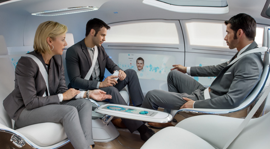 Check out these future commuters multitasking aboard a self-driving Mercedes-Benz F 015 concept car.
