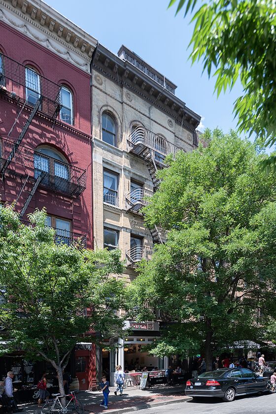 NYC Walk-Up Building Sells at a Discount, Setting Benchmark for New Rules